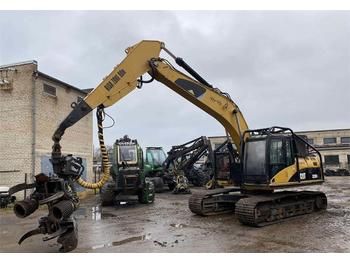 Caterpillar 323 DL + Silvatec 560  - Harvester