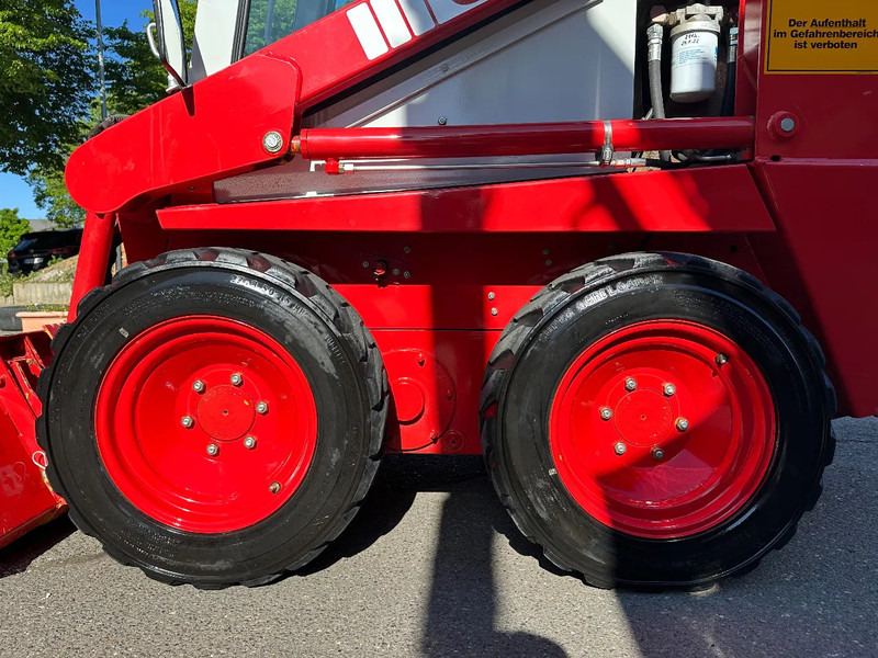 Compacte rupslader Case 1825 4x4 KOMPAKT / UNILADER mit Schaufel / Gabel