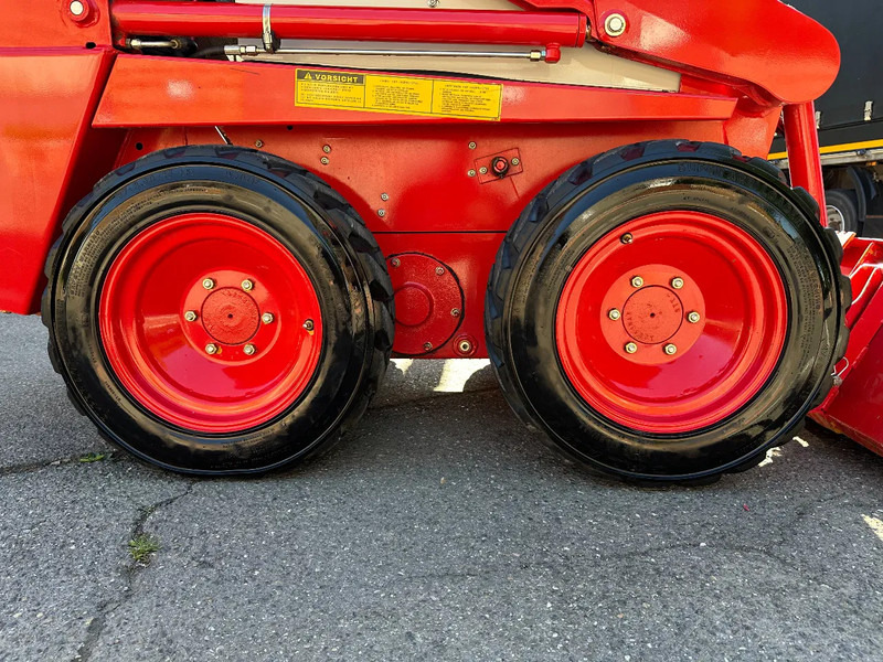 Compacte rupslader Case 1825 4x4 KOMPAKT / UNILADER mit Schaufel / Gabel