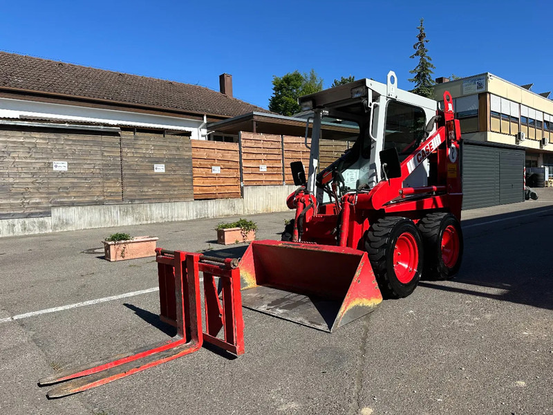 Compacte rupslader Case 1825 4x4 KOMPAKT / UNILADER mit Schaufel / Gabel