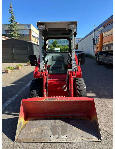 Compacte rupslader Case 1825 4x4 KOMPAKT / UNILADER mit Schaufel / Gabel