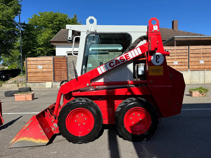 Compacte rupslader Case 1825 4x4 KOMPAKT / UNILADER mit Schaufel / Gabel