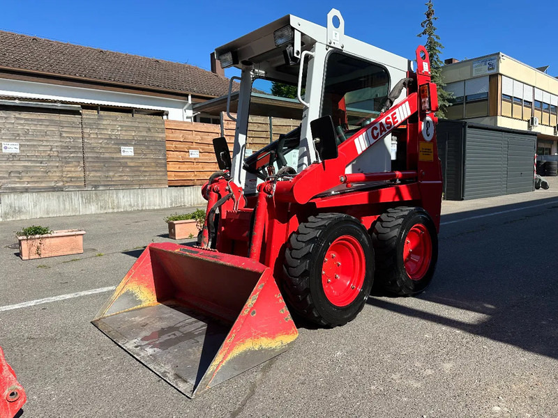 Compacte rupslader Case 1825 4x4 KOMPAKT / UNILADER mit Schaufel / Gabel