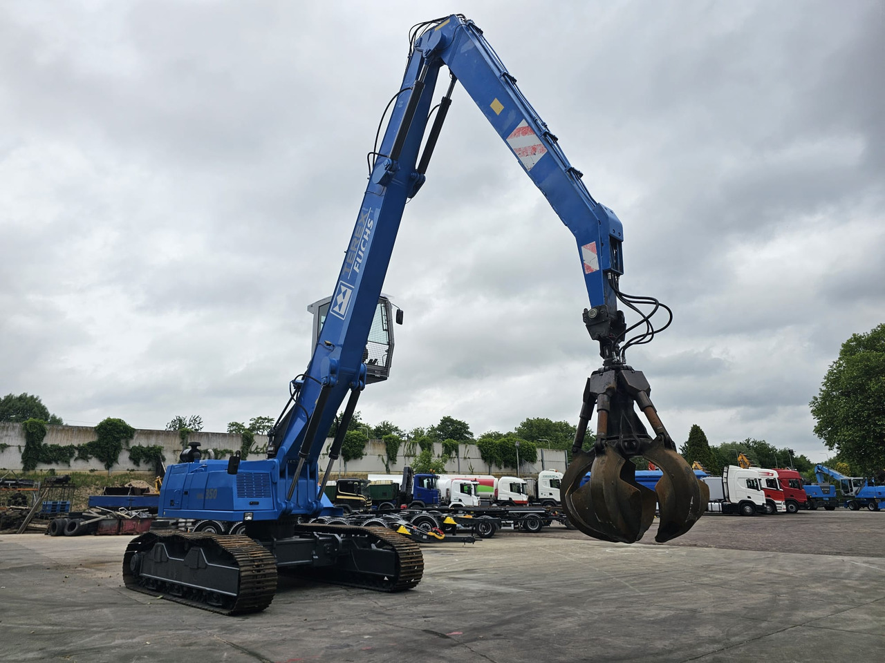 Overslagkraan Fuchs RHL 350 Materialhandler  With Adjustable Tracks
