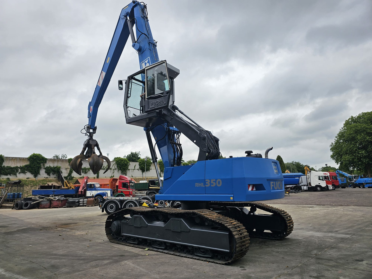 Overslagkraan Fuchs RHL 350 Materialhandler  With Adjustable Tracks