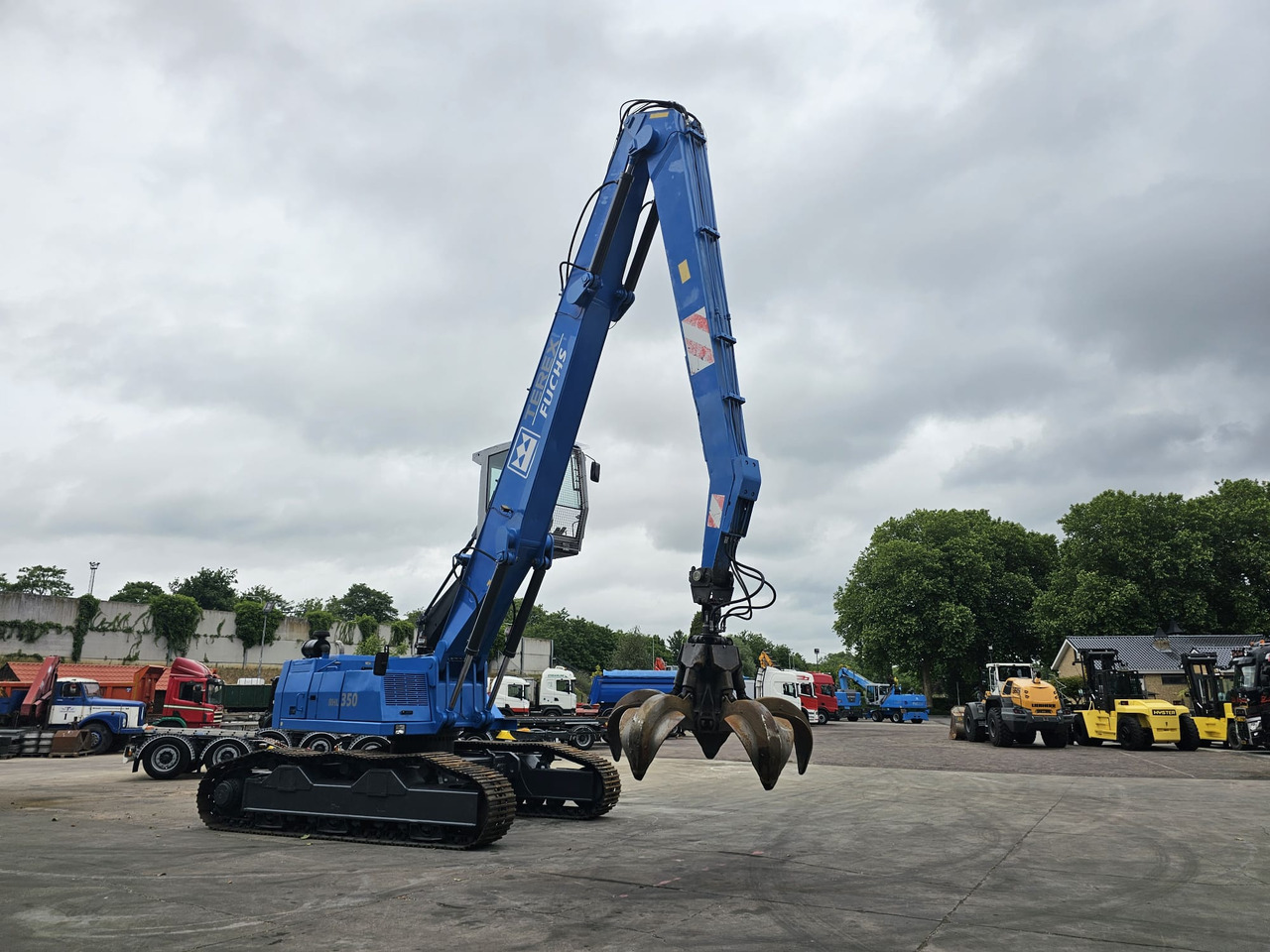 Overslagkraan Fuchs RHL 350 Materialhandler  With Adjustable Tracks