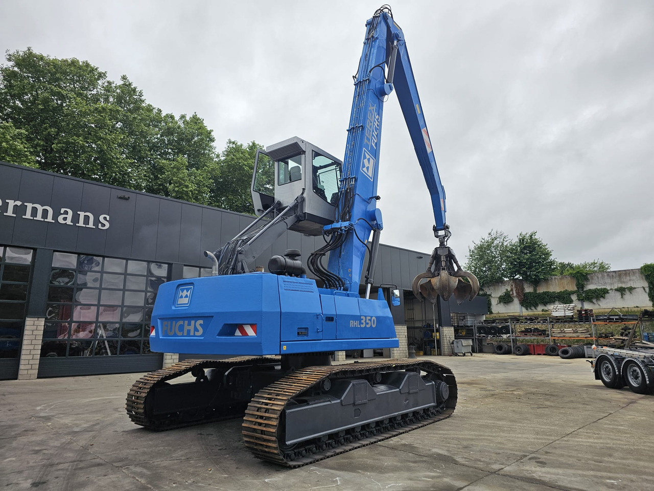 Overslagkraan Fuchs RHL 350 Materialhandler  With Adjustable Tracks