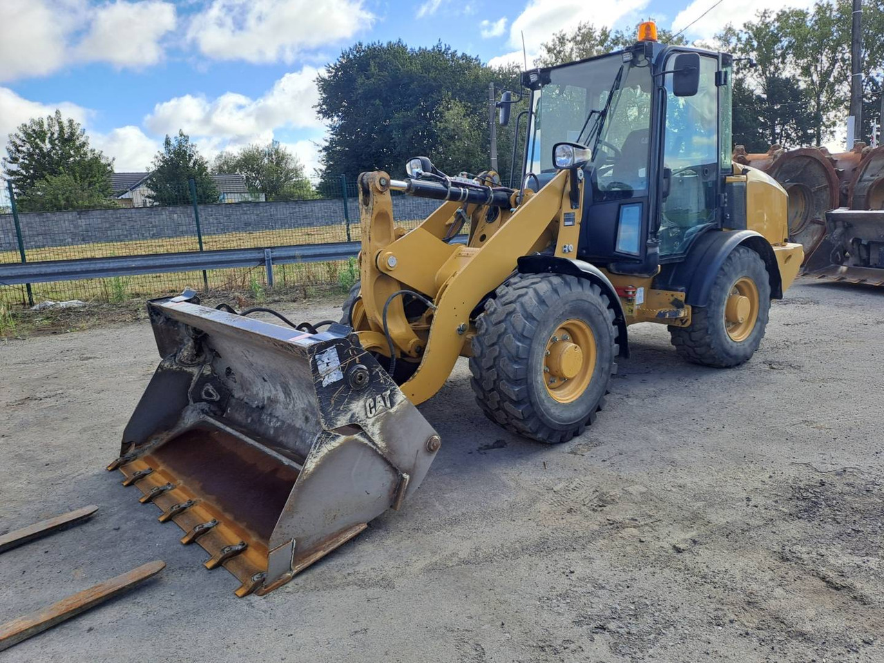 Wiellader CAT 906M