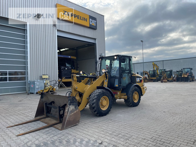 Wiellader Cat 906M