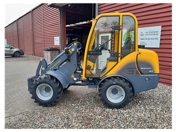 Wiellader Eurotrac W12S med førerhus, skovl og gafler 