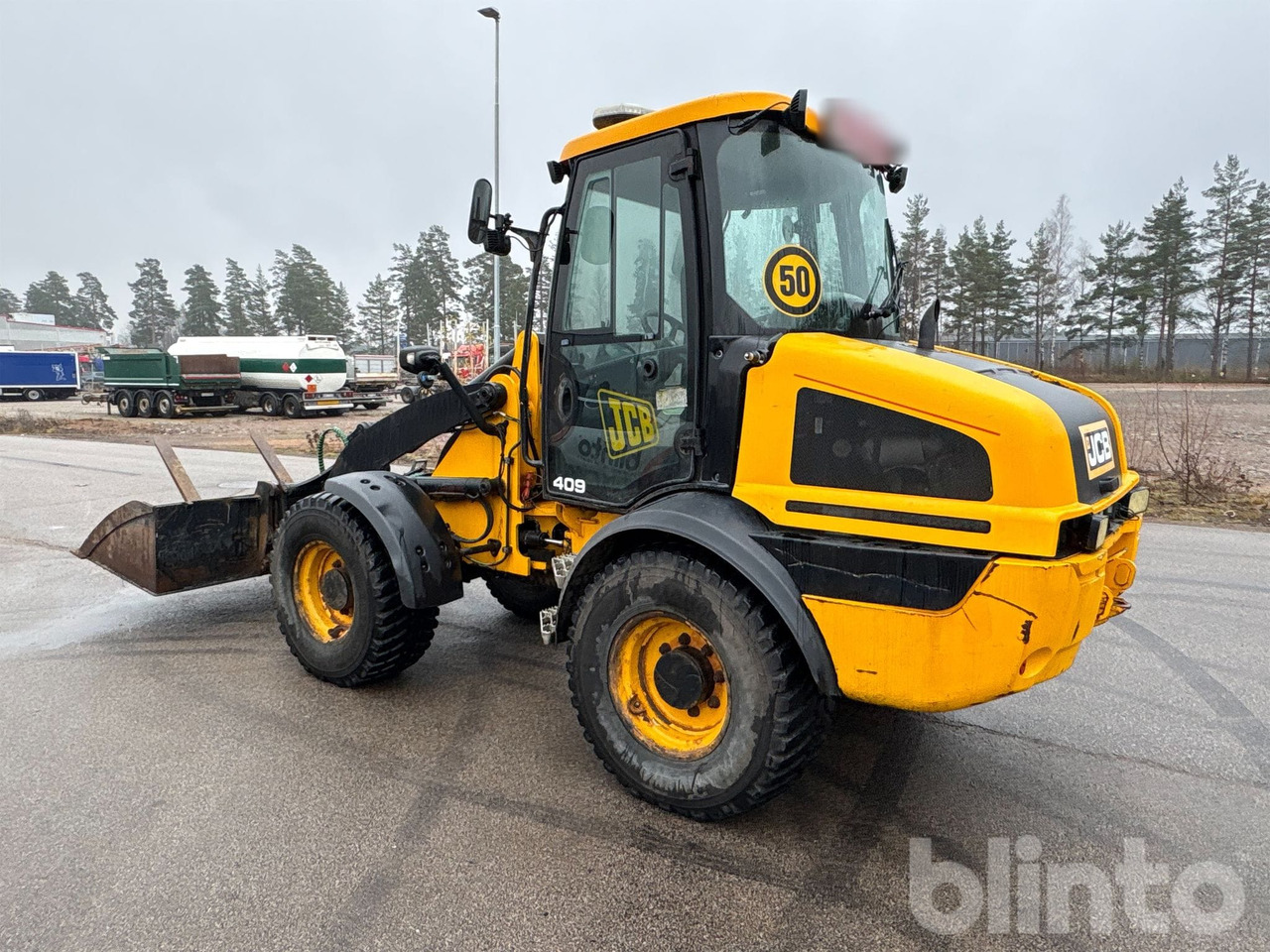 Wiellader JCB 409 T4