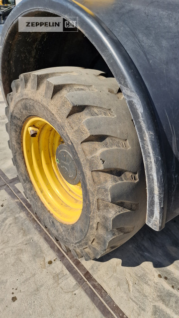 Wiellader Komatsu WA100M-7