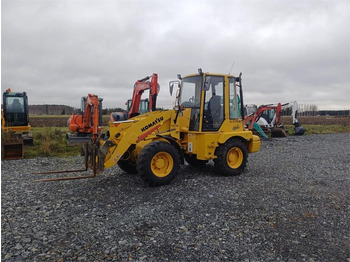 Wiellader Komatsu WB70A Pyöräkuormaaja 