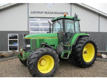 Tractor John Deere 7700 med frontlift og brede dæk: afbeelding 1