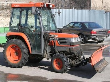 Tractor Kubota ST30 with brush and blade: afbeelding 1