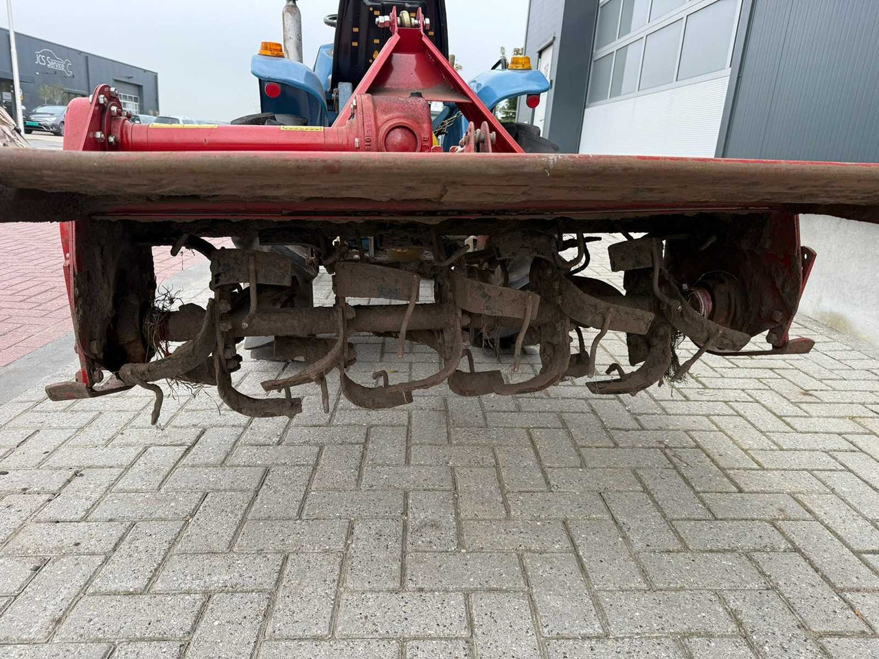 Mini tractor Hinomoto E-14 met Grondfrees