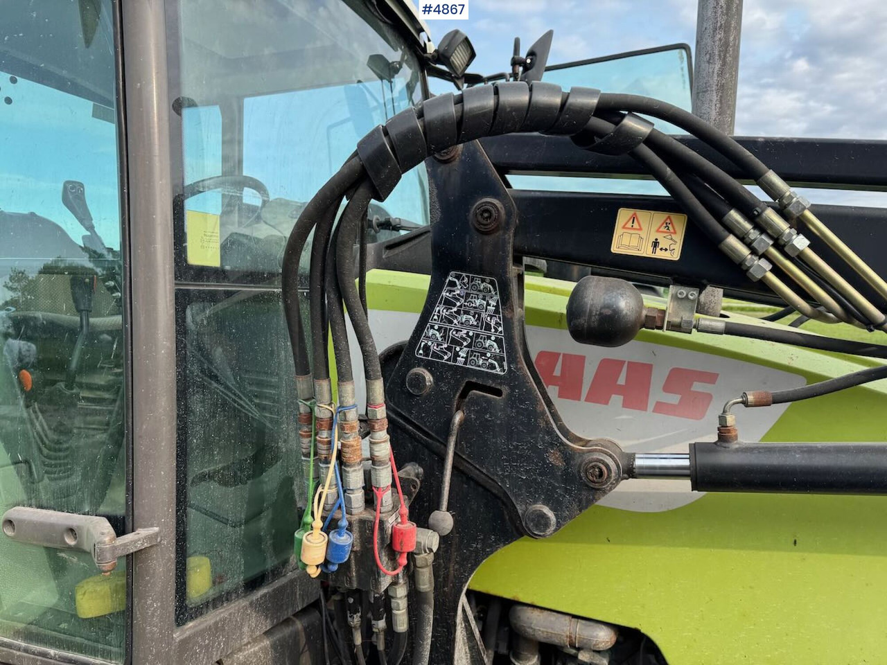Tractor 2007 Claas Celtis 446 with front loader, pallet forks, and bucket