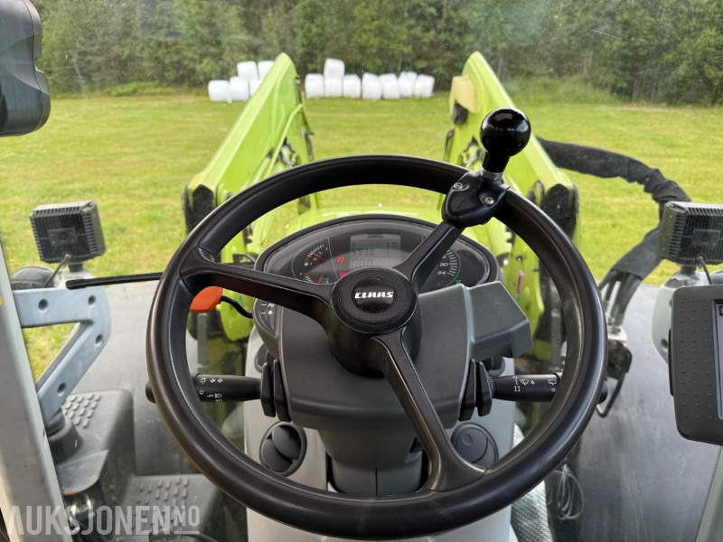 Tractor 2016 Claas Arion 650 med frontlaster, lysrigg, 2-seter, 50 Km/t, stor service