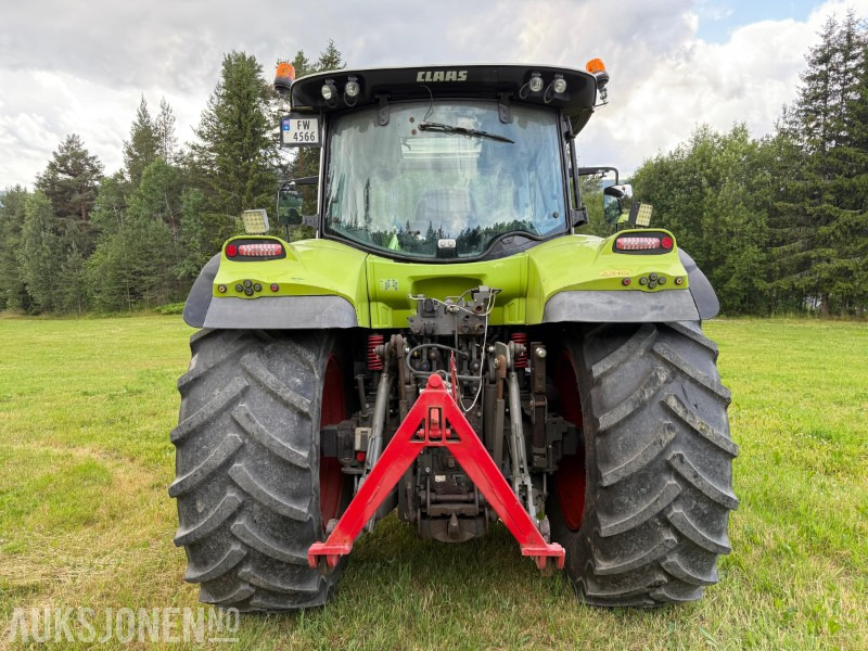 Tractor 2016 Claas Arion 650 med frontlaster, lysrigg, 2-seter, 50 Km/t, stor service