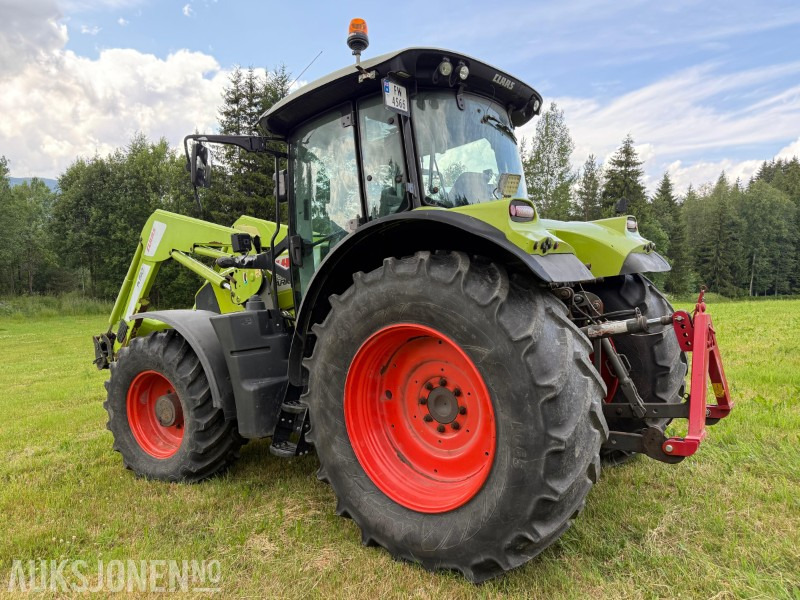 Tractor 2016 Claas Arion 650 med frontlaster, lysrigg, 2-seter, 50 Km/t, stor service