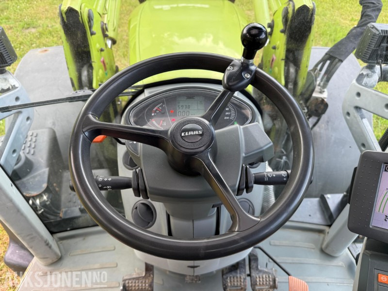 Tractor 2016 Claas Arion 650 med frontlaster, lysrigg, 2-seter, 50 Km/t, stor service