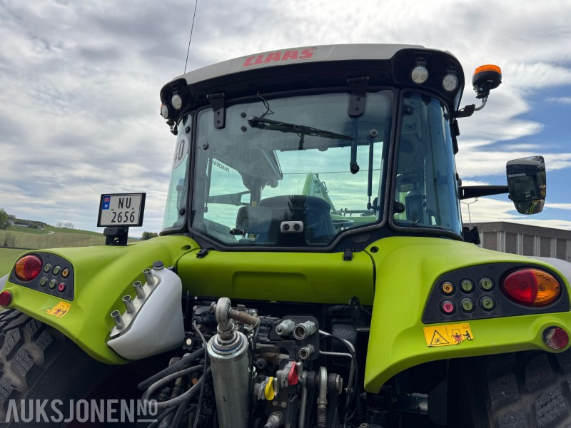 Tractor 2022 Claas Arion 450 med laster