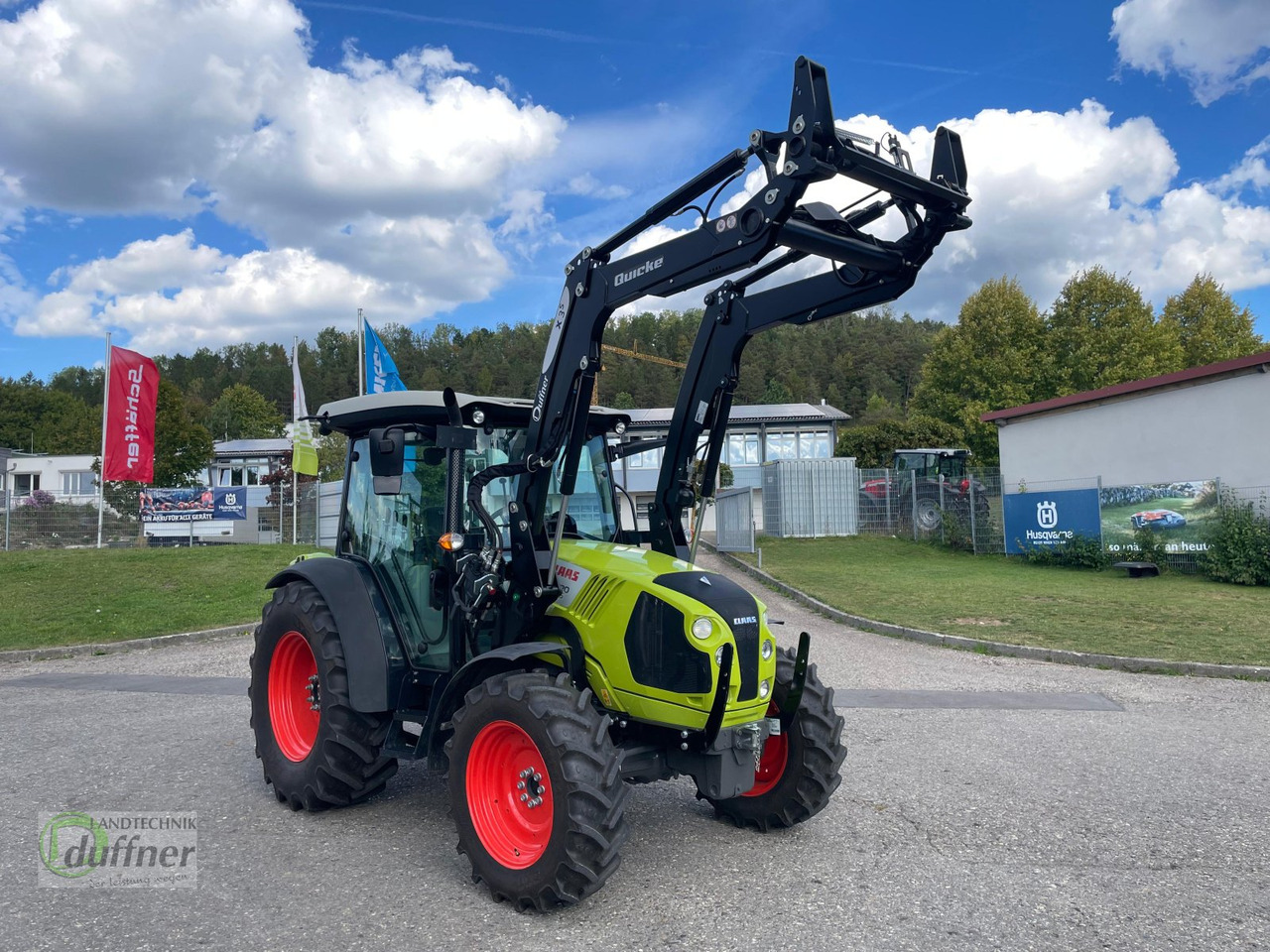 Tractor CLAAS Atos 220 C mit Quicke X3S Performance