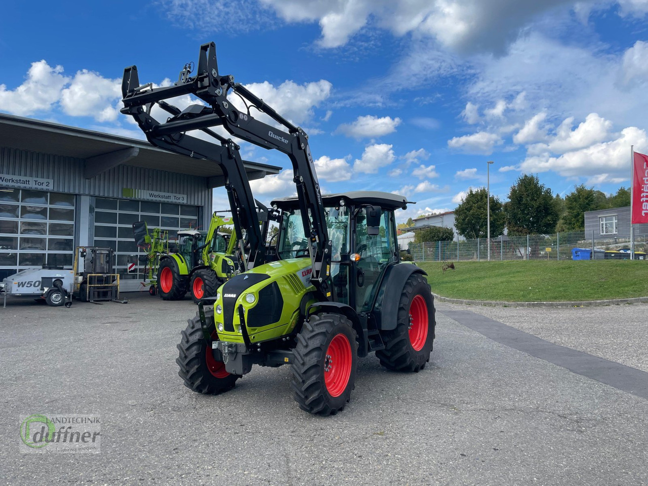 Tractor CLAAS Atos 220 C mit Quicke X3S Performance