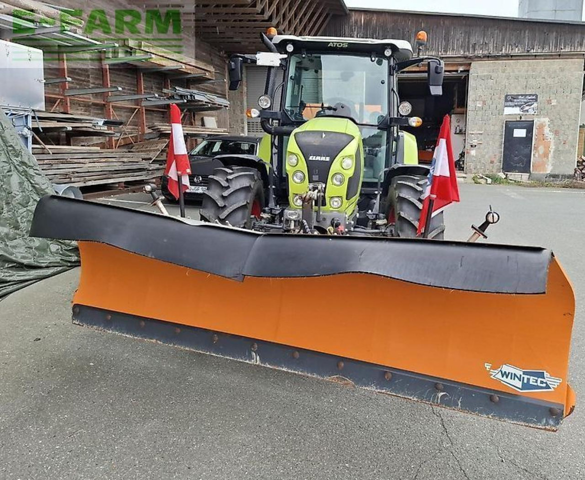 Tractor CLAAS atos 330 mit schneeschild/streuer