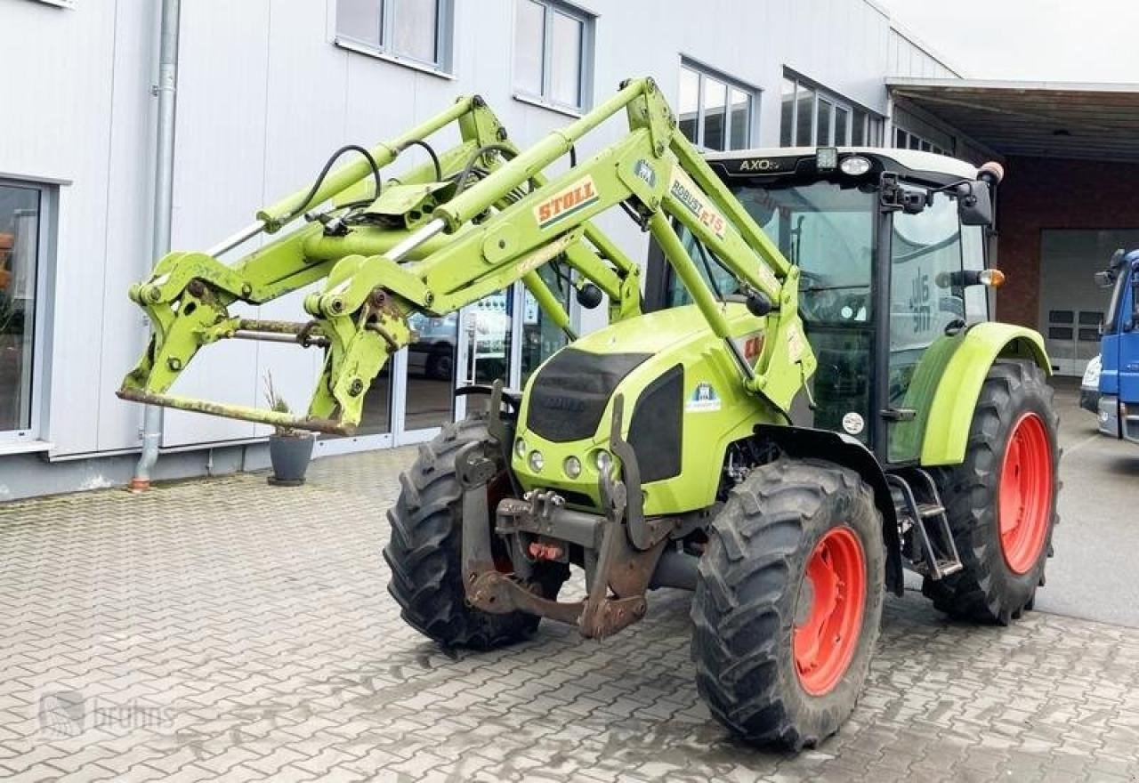 Tractor CLAAS axos 320 mit stoll frontlader