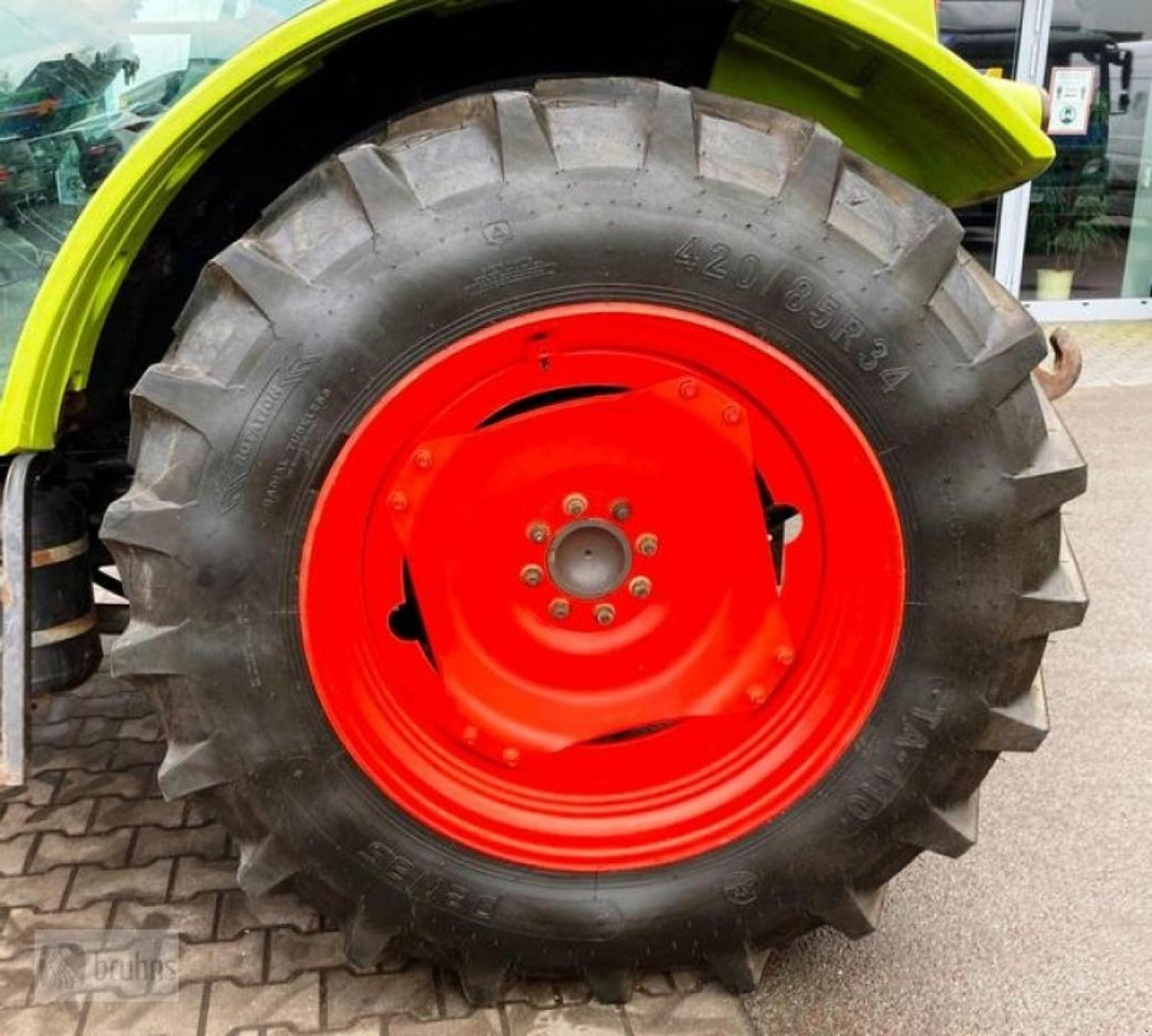 Tractor CLAAS axos 320 mit stoll frontlader