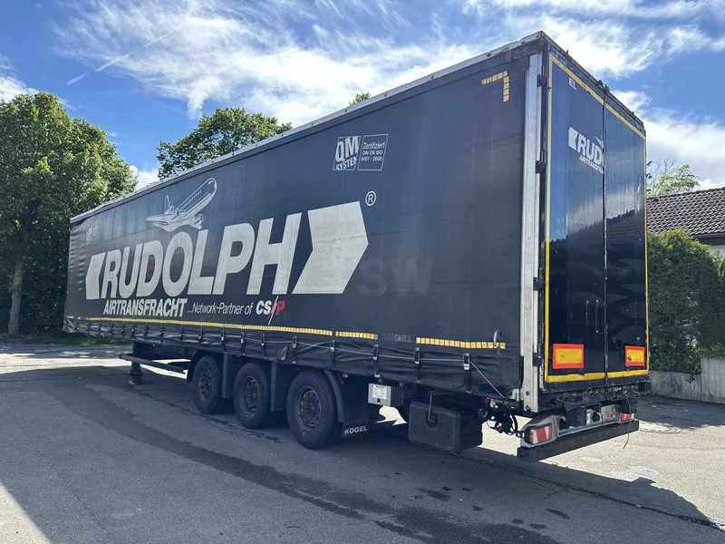 Gesloten oplegger Kögel MEGA Tautliner mit ROLLENBETT Flughafentr. MEGA Tautliner mit ROLLENBETT Flughafentr.