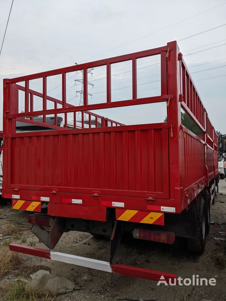 Vrachtwagen met open laadbak HOWO 8x4 drive 12 wheel general cargo stake truck flat bed: afbeelding 3