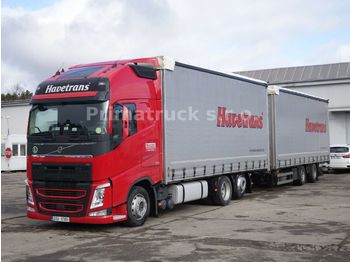Schuifzeilen vrachtwagen Volvo FH13 500 6x2 + Anhänger Schmitz