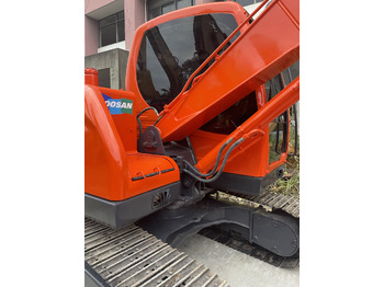 Rupsgraafmachine DOOSAN DX75