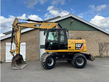 Mobiele graafmachine CATERPILLAR M313D