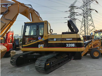 Rupsgraafmachine CATERPILLAR