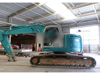 Rupsgraafmachine NEW HOLLAND