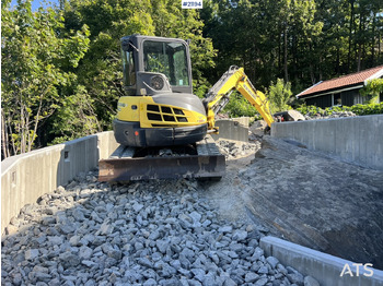 Rupsgraafmachine NEW HOLLAND