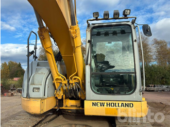 Rupsgraafmachine NEW HOLLAND