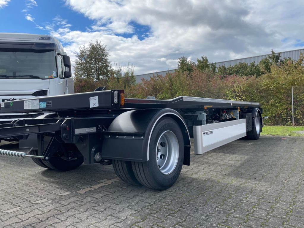 Wielton 2-Achs Außenroller-Abrollanhänger Wielton 2-Achs Außenroller-Abrollanhänger - Haakarm/ Portaalarm aanhanger: afbeelding 1 Wielton 2-Achs Außenroller-Abrollanhänger Wielton 2-Achs Außenroller-Abrollanhänger - Haakarm/ Portaalarm aanhanger: afbeelding 1