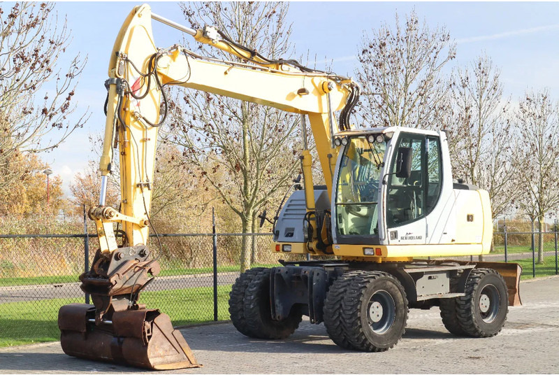 New Holland MH CITY | TILT BUCKET | QUICK COUPLER | DOZER BLADE - Mobiele graafmachine: afbeelding 2 New Holland MH CITY | TILT BUCKET | QUICK COUPLER | DOZER BLADE - Mobiele graafmachine: afbeelding 2
