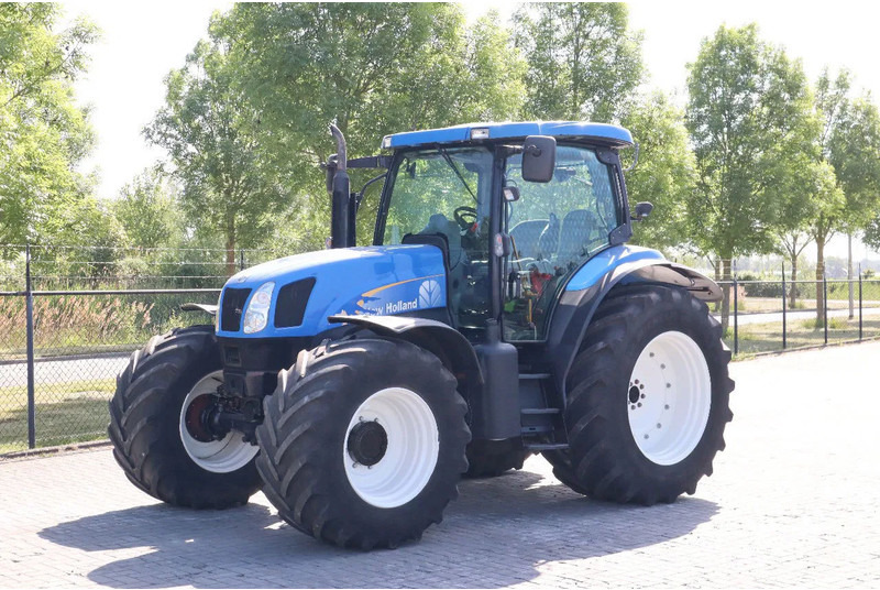 New Holland TS135A | 40 KM/H | 4X4 | SUPERSTEER - Tractor: afbeelding 1 New Holland TS135A | 40 KM/H | 4X4 | SUPERSTEER - Tractor: afbeelding 1