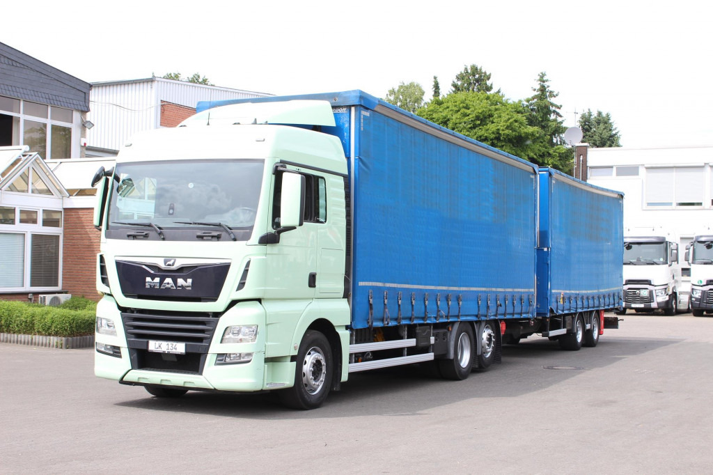 MAN TGX 26.460 Retarder Jumbo-Zug 120M3 Durchlade - Schuifzeilen vrachtwagen: afbeelding 1 MAN TGX 26.460 Retarder Jumbo-Zug 120M3 Durchlade - Schuifzeilen vrachtwagen: afbeelding 1
