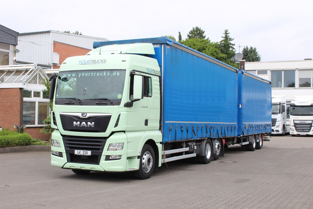 MAN TGX 26.460 Retarder Jumbo-Zug 120M3 Durchlade - Schuifzeilen vrachtwagen: afbeelding 1 MAN TGX 26.460 Retarder Jumbo-Zug 120M3 Durchlade - Schuifzeilen vrachtwagen: afbeelding 1