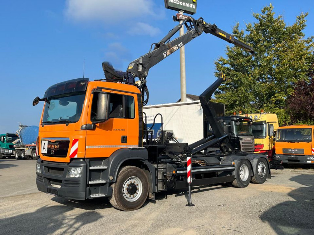 MAN TG-S 26.400 6x4H-2 BL Abrollkipper mit Kran Lift Lenk - Haakarmsysteem vrachtwagen, Kraanwagen: afbeelding 1 MAN TG-S 26.400 6x4H-2 BL Abrollkipper mit Kran Lift Lenk - Haakarmsysteem vrachtwagen, Kraanwagen: afbeelding 1
