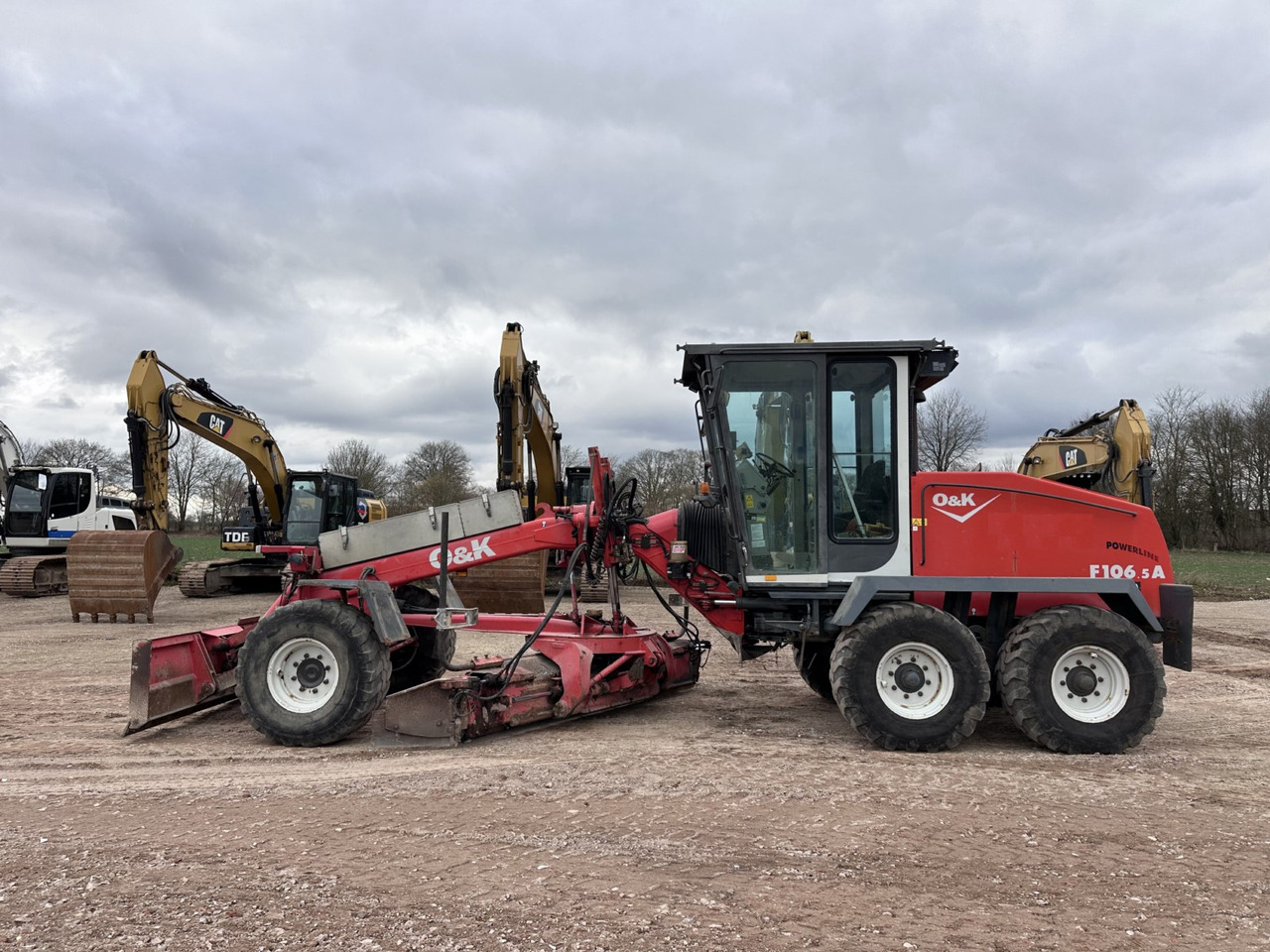 O&K F 106.5 - 6x6 Laser Topcon- Klima Cummins 6 Zyl. - Grader: afbeelding 1 O&K F 106.5 - 6x6 Laser Topcon- Klima Cummins 6 Zyl. - Grader: afbeelding 1