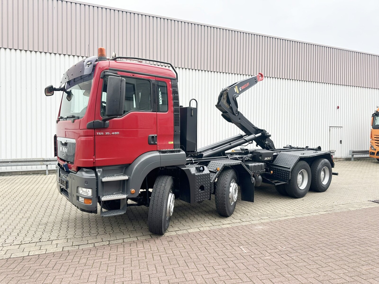 MAN TGS 35.480 8X4 BL TGS 35.400 8x4 BL, Schub-Knick bis 6,5m Container - Haakarmsysteem vrachtwagen: afbeelding 1 MAN TGS 35.480 8X4 BL TGS 35.400 8x4 BL, Schub-Knick bis 6,5m Container - Haakarmsysteem vrachtwagen: afbeelding 1