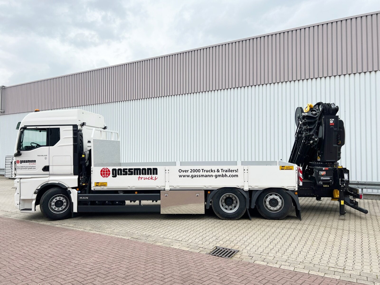 MAN TGX 26.510 6x2-4 LL CH TGX 26.510 6x2-4 LL, Kran Hiab X-HiPro 548 E-8, Lenk-/Liftachse, TwistLock 20Fuß, Funk, Retarder - Kraanwagen, Vrachtwagen met open laadbak: afbeelding 2 MAN TGX 26.510 6x2-4 LL CH TGX 26.510 6x2-4 LL, Kran Hiab X-HiPro 548 E-8, Lenk-/Liftachse, TwistLock 20Fuß, Funk, Retarder - Kraanwagen, Vrachtwagen met open laadbak: afbeelding 2