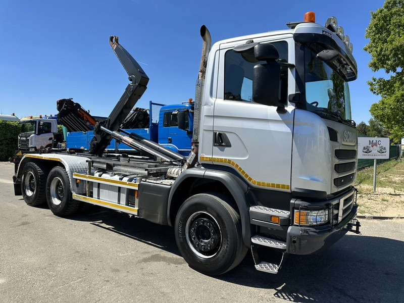 Scania G450 6x4 HAAKSYSTEEM AJK 20T - 5760mm - 3m90 WB - BLADVERING / NAAFREDUCTIE - EURO 6 - BE TRUCK - Haakarmsysteem vrachtwagen: afbeelding 1 Scania G450 6x4 HAAKSYSTEEM AJK 20T - 5760mm - 3m90 WB - BLADVERING / NAAFREDUCTIE - EURO 6 - BE TRUCK - Haakarmsysteem vrachtwagen: afbeelding 1
